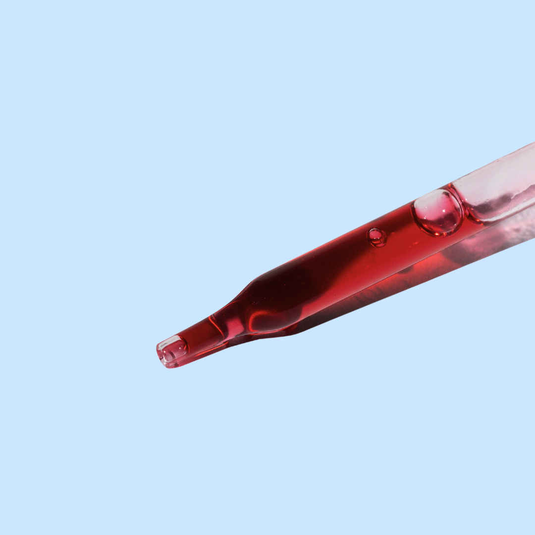 A close-up image of liquid L-Methylfolate for kids in a dropper